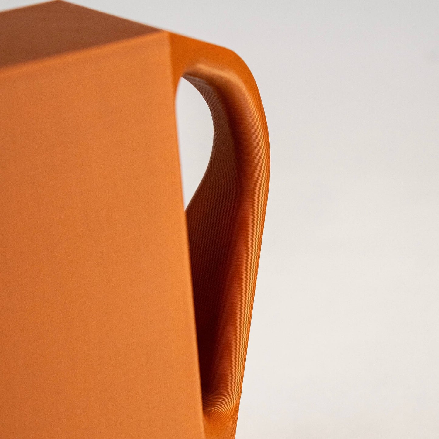 The Watering Jar, a compact water container to elevate your plant care routine.