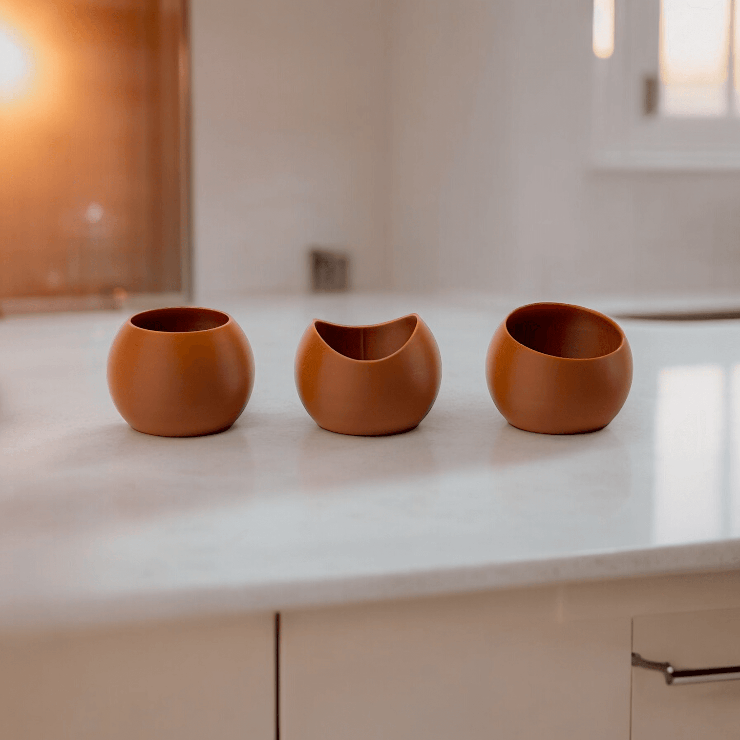 Terra Vessels. Three compact and versatile planters for small plants.